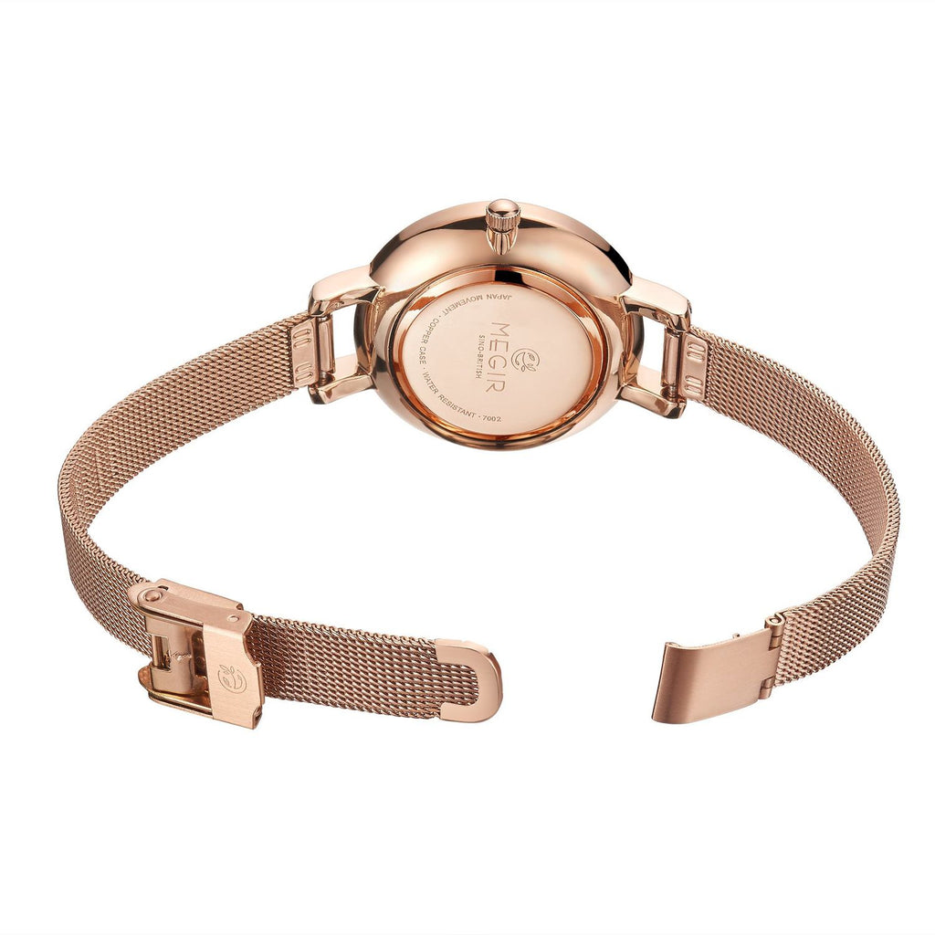 MEGIR 7002 women's quartz watch caseback with engraved branding and rose-gold mesh bracelet clasp