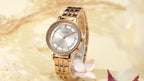MEGIR 7012 women's quartz watch, rose-gold case, silver-white dial and rose-gold bracelet, styled with flowers