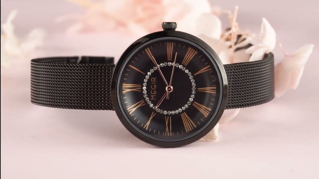 MEGIR 7014 women's quartz watch, black case, black Roman-numeral dial and black mesh bracelet, styled with flowers