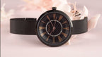 MEGIR 7014 women's quartz watch, black case, black Roman-numeral dial and black mesh bracelet, styled with flowers