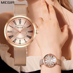 MEGIR 7014 women's quartz watch, rose-gold case, rose Roman-numeral dial and rose-gold mesh bracelet, front and wrist
