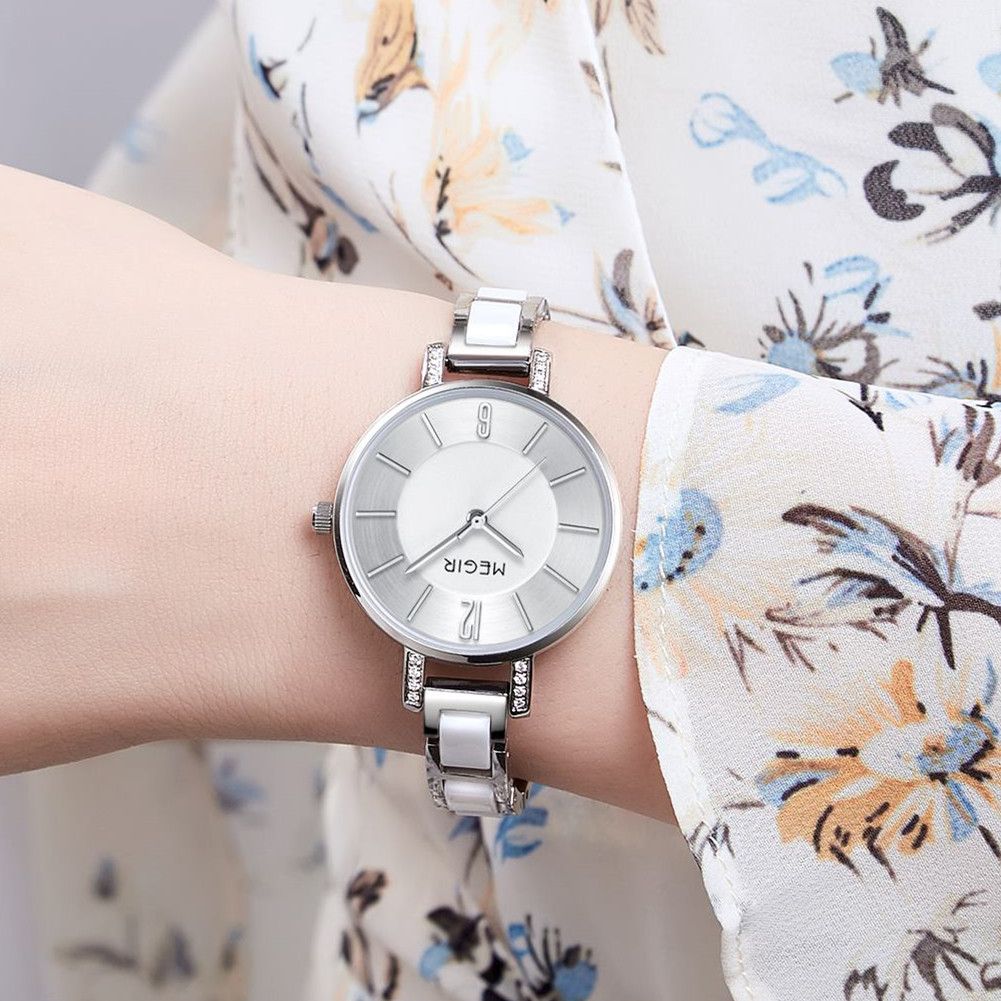 MEGIR 7016 quartz watch on the wrist, silver case, silver-white dial and white-and-silver link bracelet