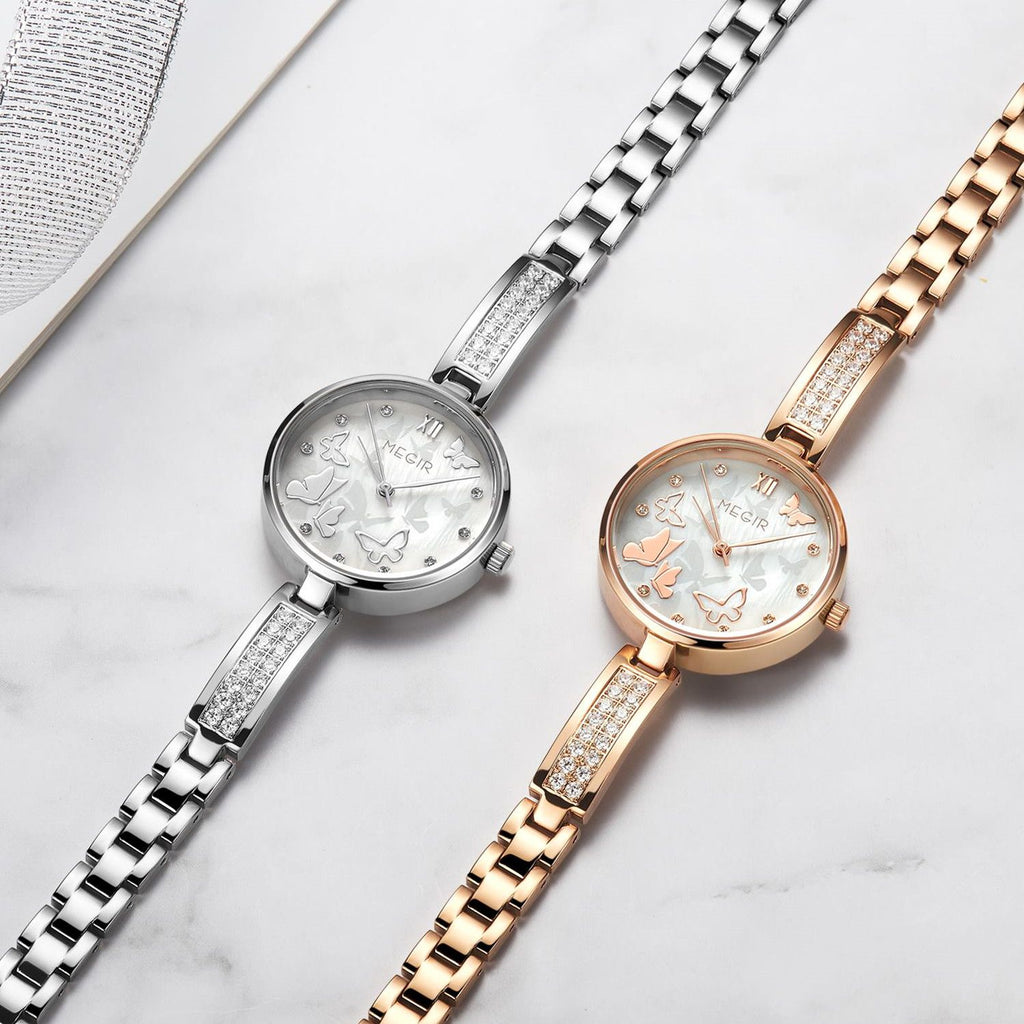 MEGIR 7018 women's diamond quartz watch color options showing silver and rose-gold butterfly-dial models
