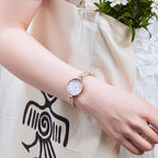 MEGIR 7018 diamond quartz watch on the wrist, rose-gold case, butterfly pearl dial and crystal bracelet