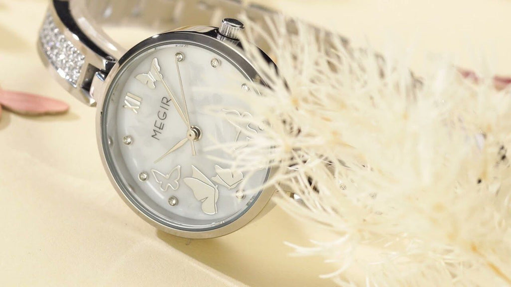 MEGIR 7018 women's diamond quartz watch, silver case, butterfly mother-of-pearl dial, styled with feather
