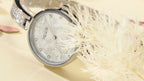 MEGIR 7018 women's diamond quartz watch, silver case, butterfly mother-of-pearl dial, styled with feather