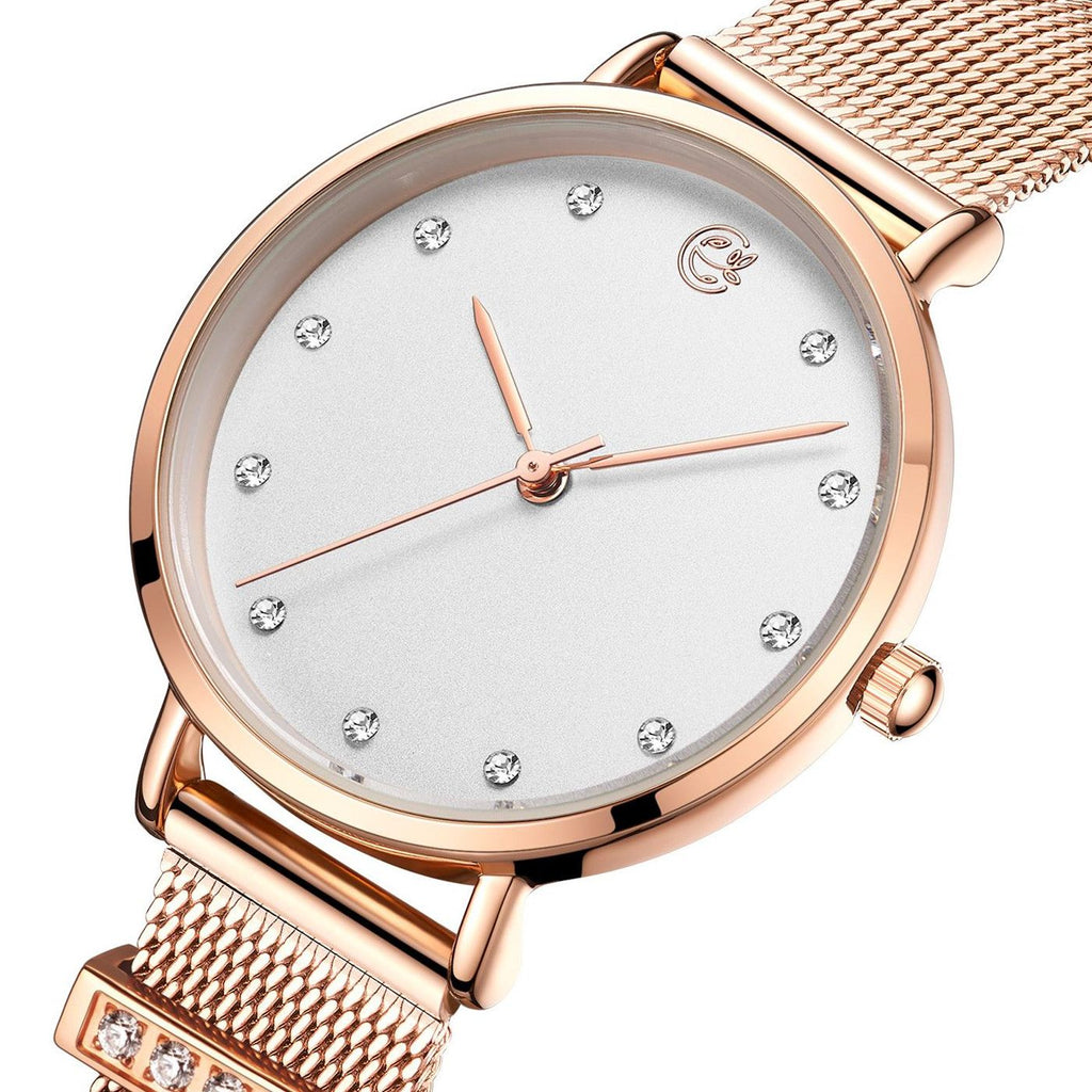 MEGIR 7022 women's quartz watch, white dial with crystal markers and rose-gold mesh bracelet, angled view