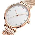 MEGIR 7022 women's quartz watch, white dial with crystal markers and rose-gold mesh bracelet, angled view