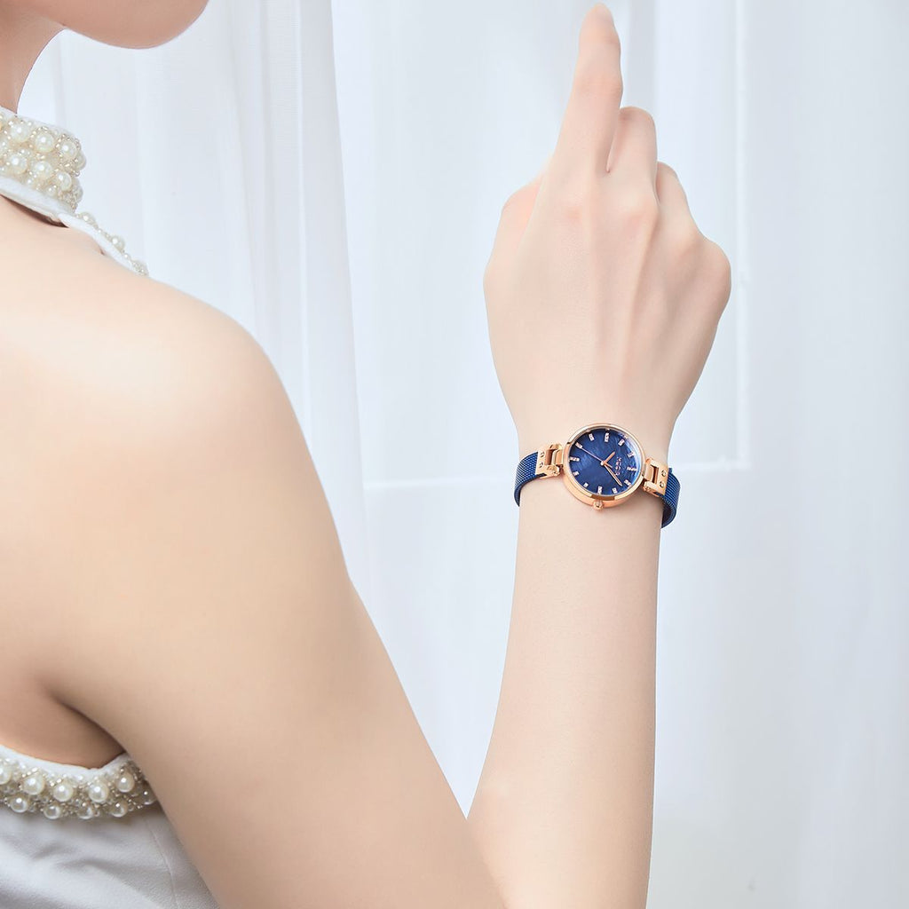 MEGIR 7025 quartz watch on the wrist, blue dial and blue mesh bracelet