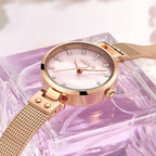 MEGIR 7025 women's quartz watch, pink dial and rose-gold mesh bracelet, styled on crystal