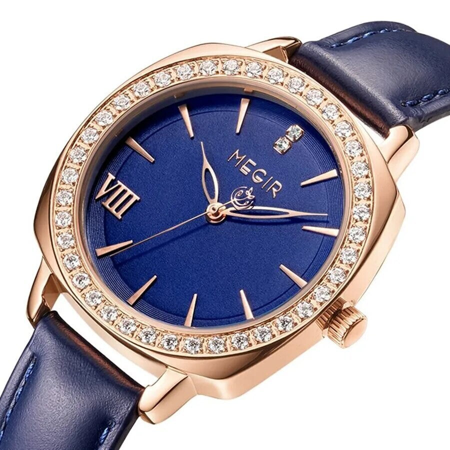 MEGIR 7029 women's diamond quartz watch, rose-gold crystal-set bezel, blue dial and blue leather strap, angled view