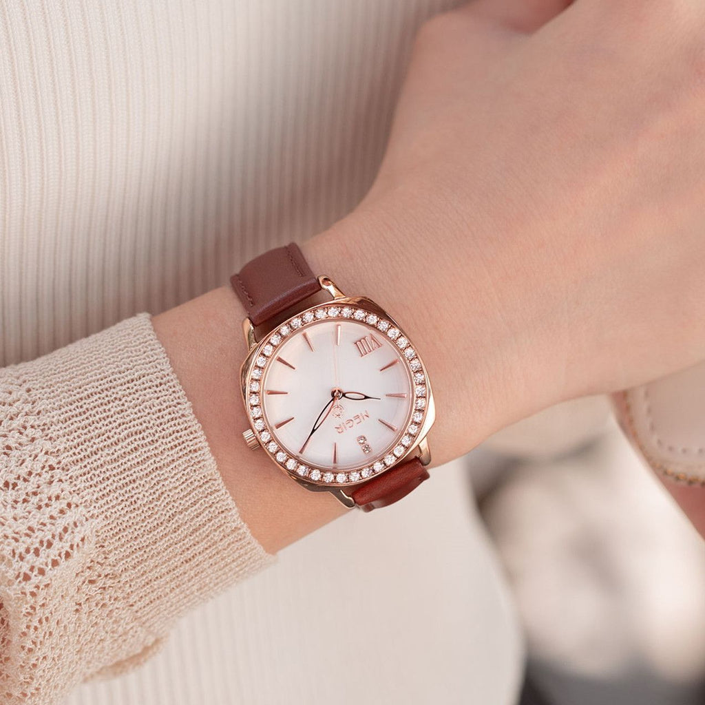MEGIR 7029 diamond quartz watch on the wrist, rose-gold case, white dial and brown leather strap