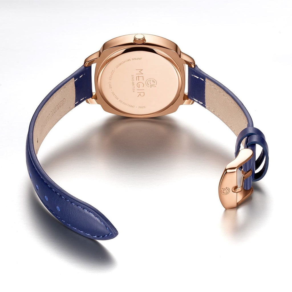 MEGIR 7029 diamond quartz watch rose-gold-tone caseback with engraved branding and blue leather strap