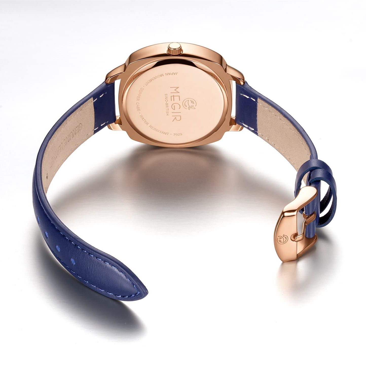 MEGIR 7029 diamond quartz watch rose-gold-tone caseback with engraved branding and blue leather strap
