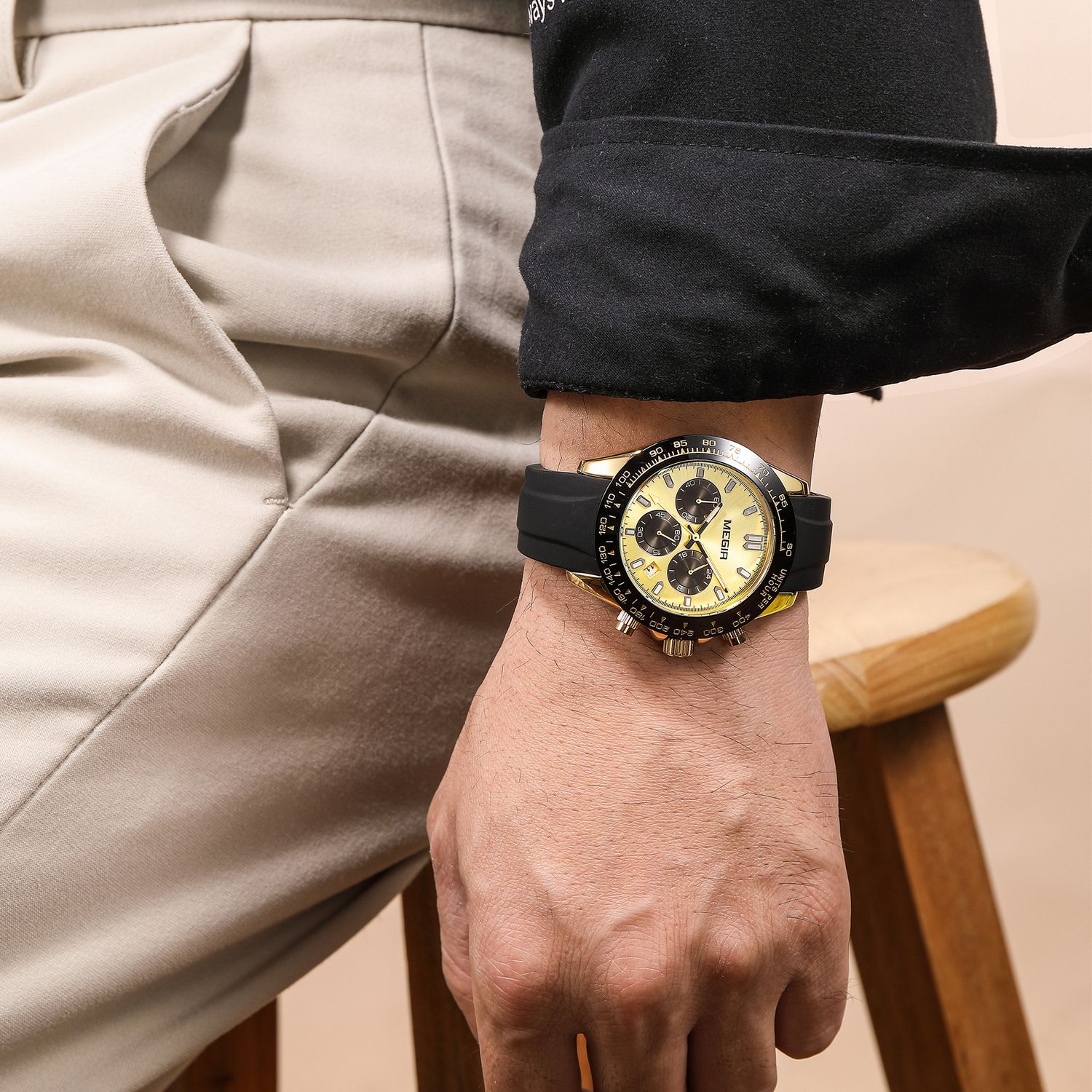 MEGIR 8104 chronograph watch on the wrist, gold case, gold dial and black silicone strap