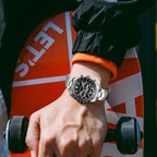 MEGIR 8104 chronograph watch on the wrist, silver case, black dial and stainless steel bracelet