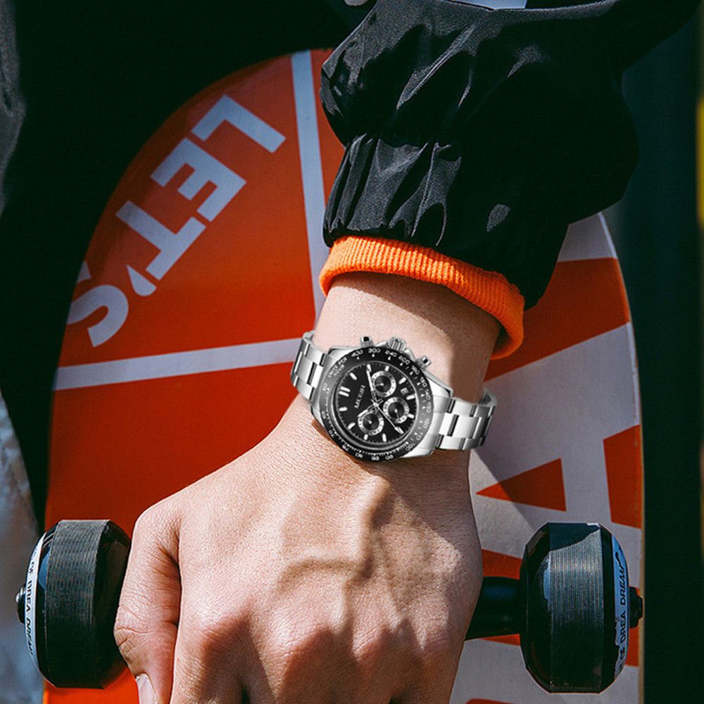 MEGIR 8104 chronograph watch on the wrist, silver case, black dial and stainless steel bracelet