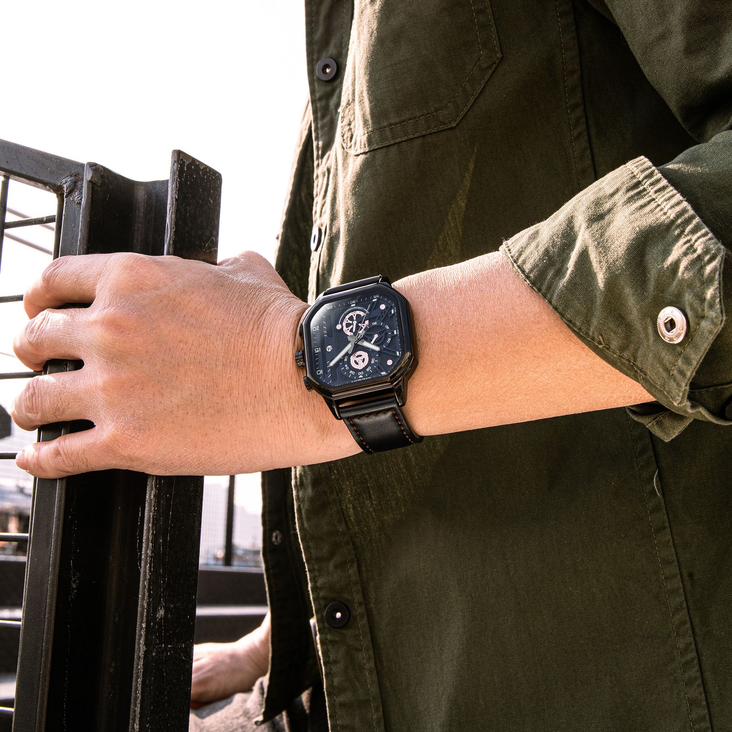 MEGIR 8106 chronograph watch on the wrist, black case, black dial and black leather strap