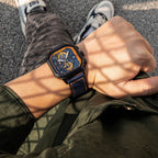 MEGIR 8106 chronograph watch on the wrist, black case, blue and orange dial and blue leather strap