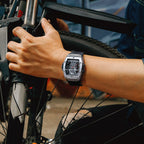 MEGIR 8109 skeleton quartz watch on the wrist, silver case, skeleton dial and black silicone strap
