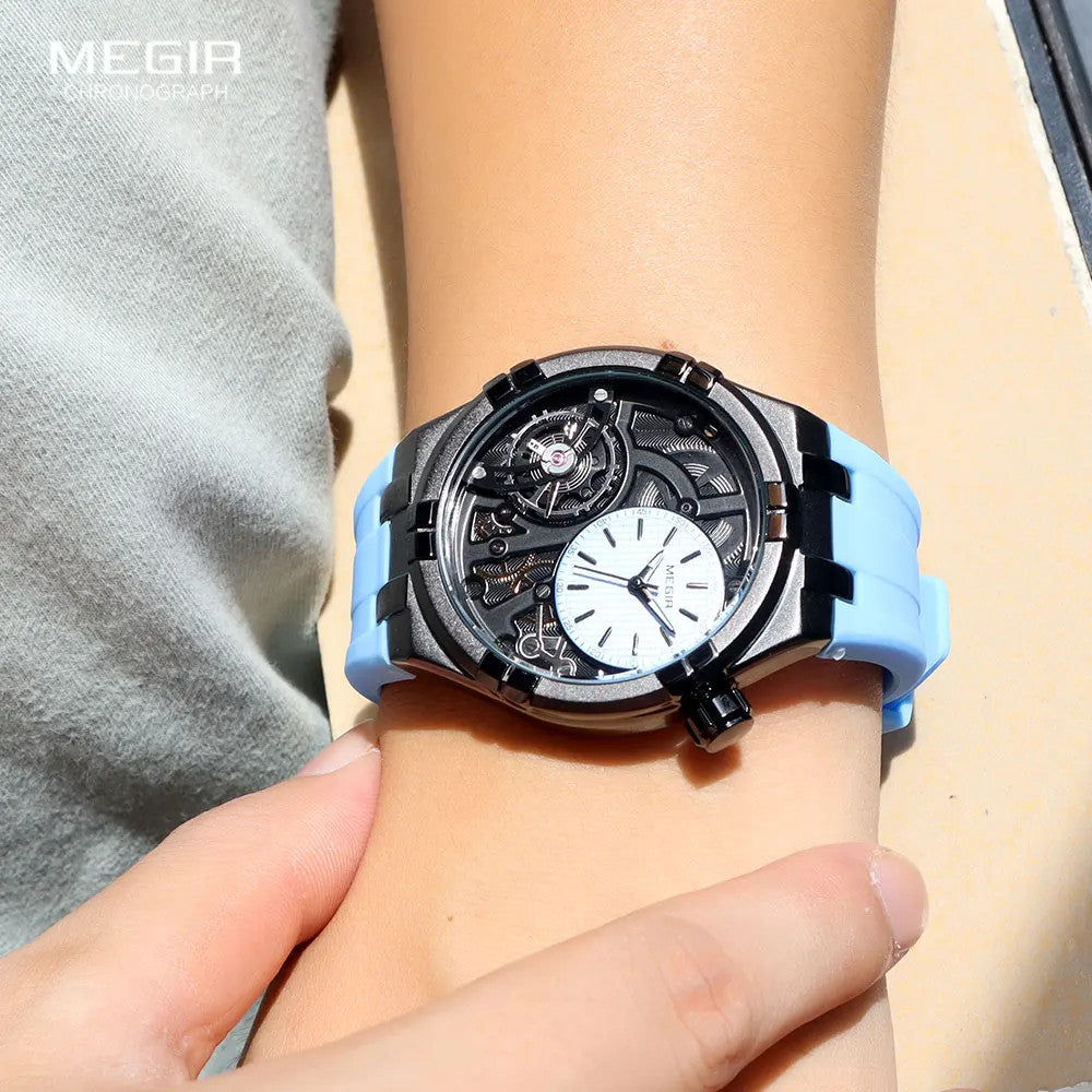 MEGIR 8111 mens quartz sport analog watch with skeleton dial and blue silicone strap on wrist