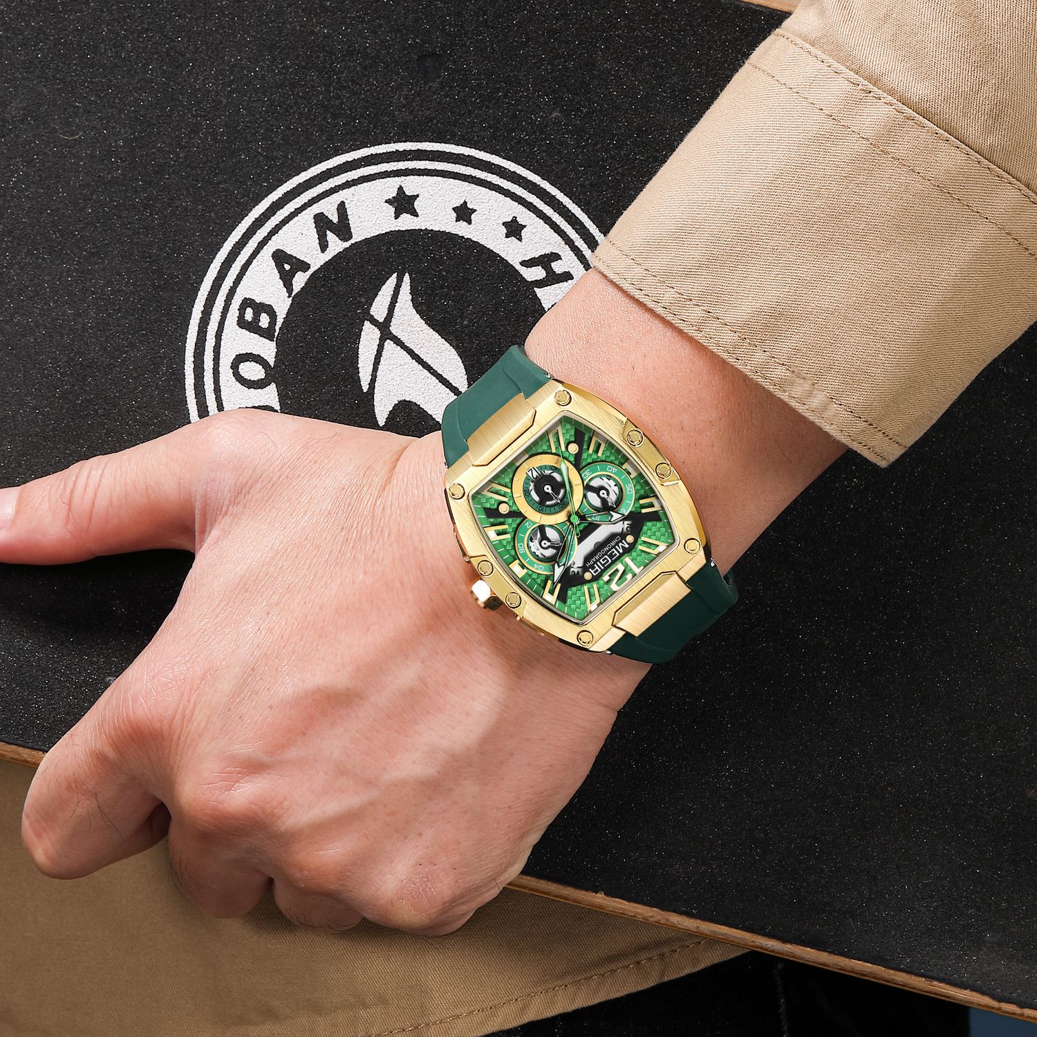 MEGIR 8112 chronograph watch on the wrist, gold tonneau case, green dial and green silicone strap