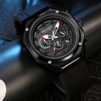 MEGIR 8118 men's chronograph watch, black case, black dial with red-tipped hands and black silicone strap, angled view
