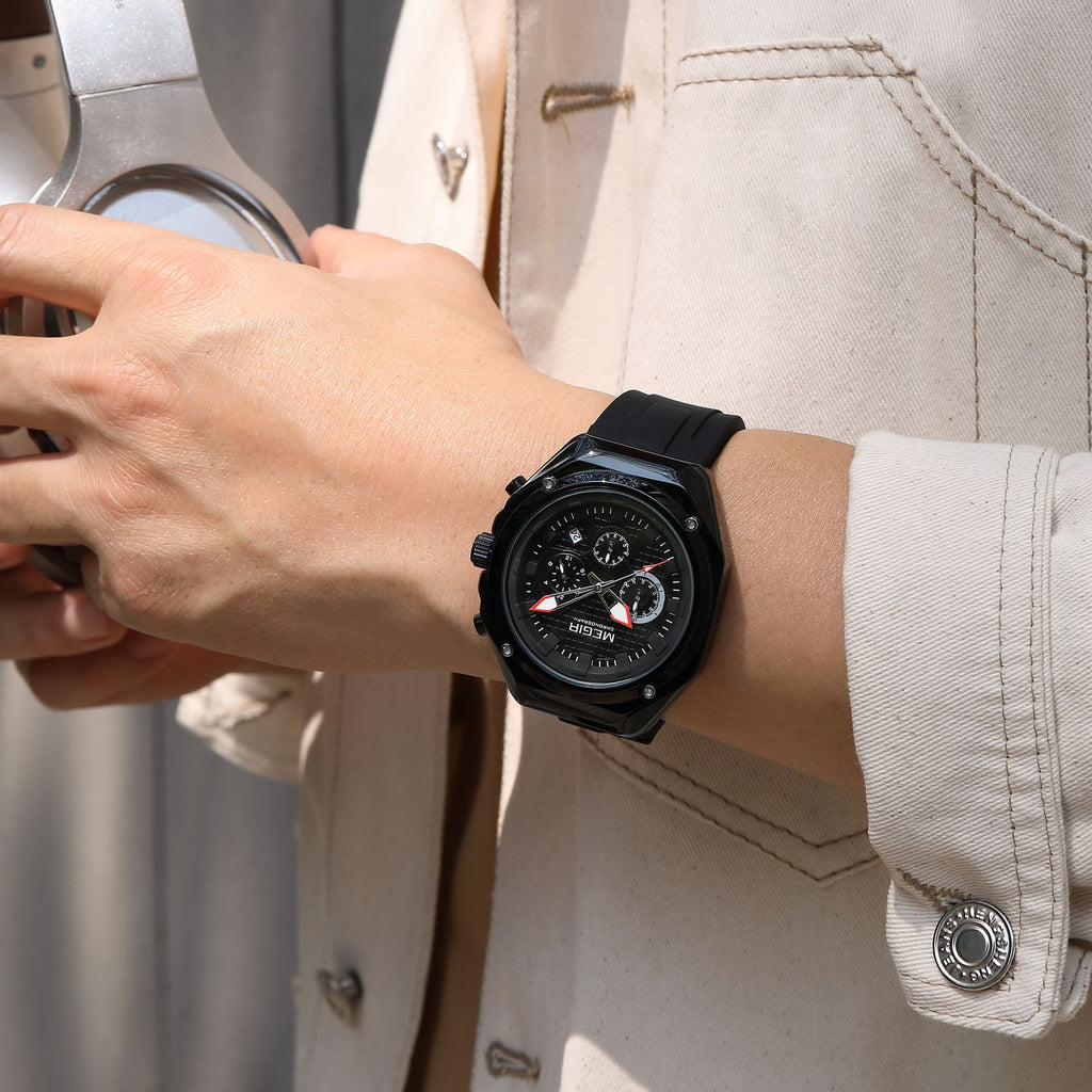 MEGIR 8118 chronograph watch on the wrist, black case, black dial and black silicone strap