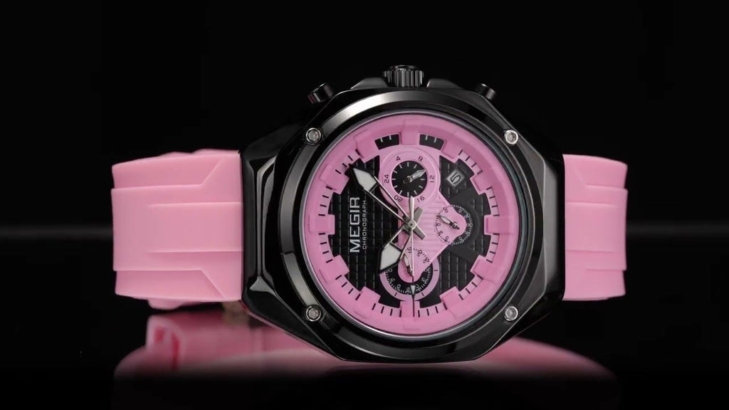 MEGIR 8118 men's chronograph watch, black case, pink dial and pink silicone strap, angled view on dark background