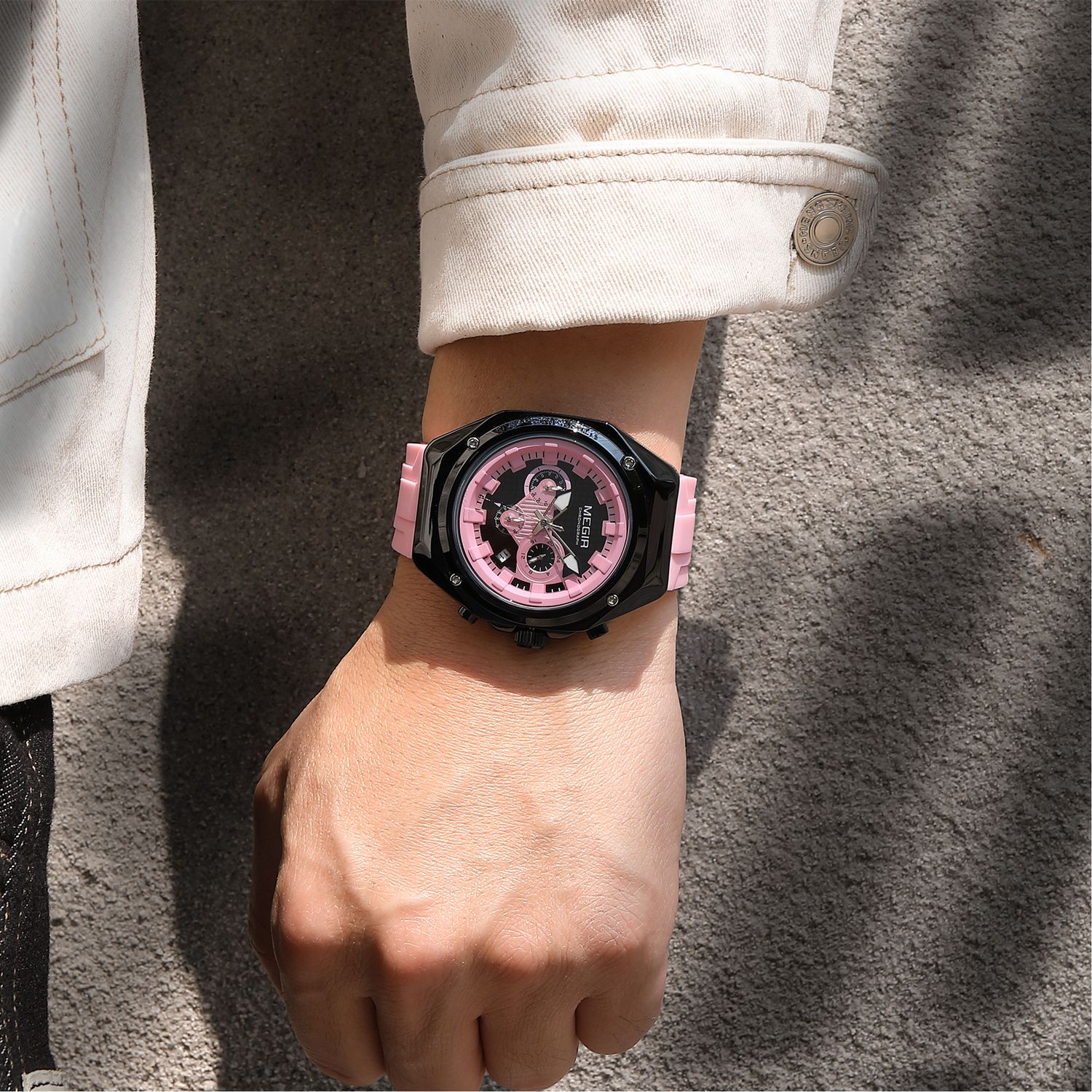 MEGIR 8118 chronograph watch on the wrist, black case, pink dial and pink silicone strap