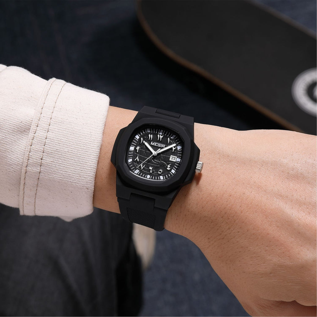 MEGIR 8119 quartz watch on the wrist, black case, white Arabic numerals and black silicone strap