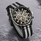 MEGIR 8121 men's chronograph watch, black case, grey dial with gold accents and black-grey nylon strap, angled view