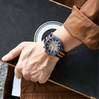 MEGIR 8121 chronograph watch on the wrist, black case, dark dial and black-orange nylon strap