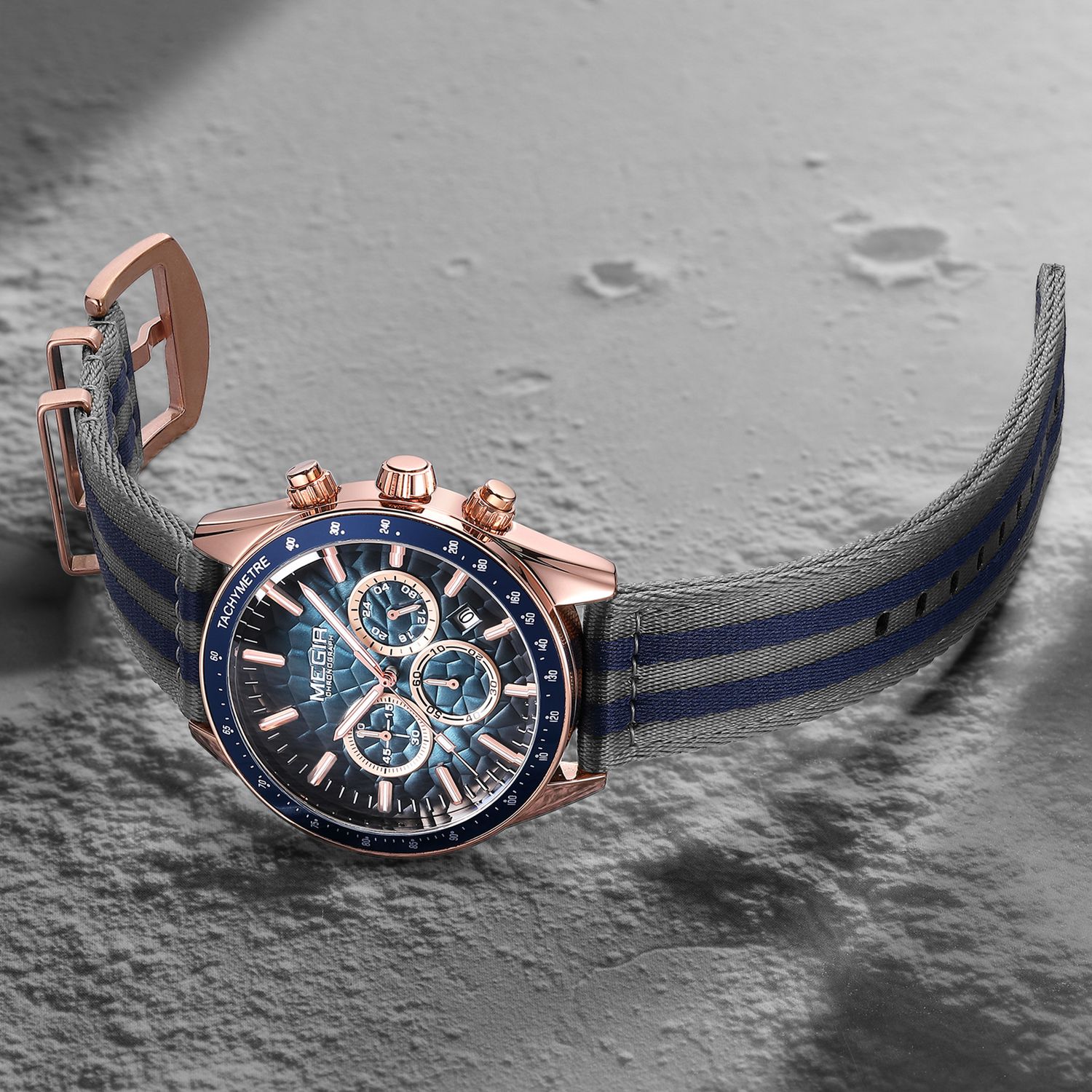 MEGIR 8121 men's chronograph watch, rose-gold case, blue dial and grey-blue nylon strap, angled view