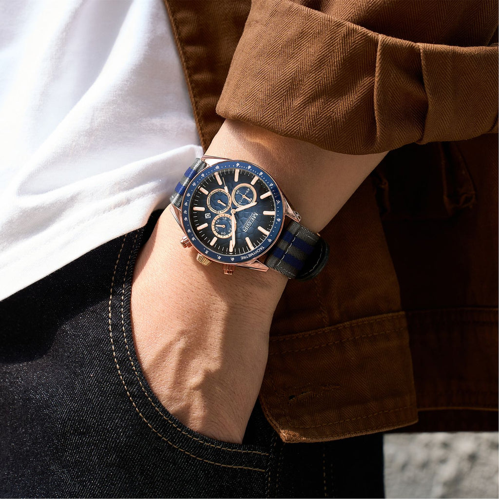 MEGIR 8121 chronograph watch on the wrist, rose-gold case, blue dial and grey-blue nylon strap