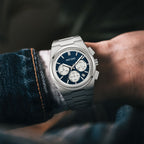 MEGIR 8402 chronograph watch on the wrist, silver case, blue dial and steel bracelet