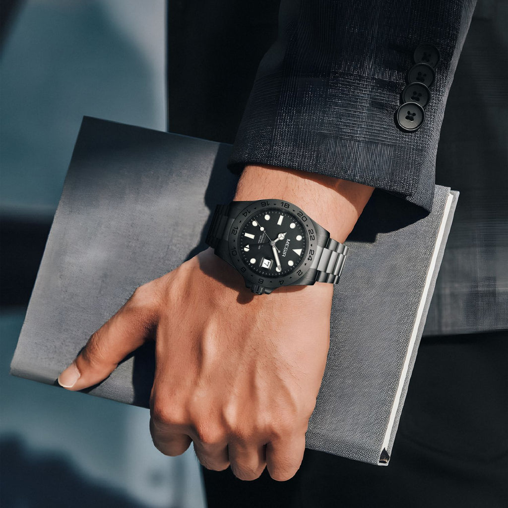 MEGIR 8404 GMT watch on the wrist, black case, black dial and black steel bracelet