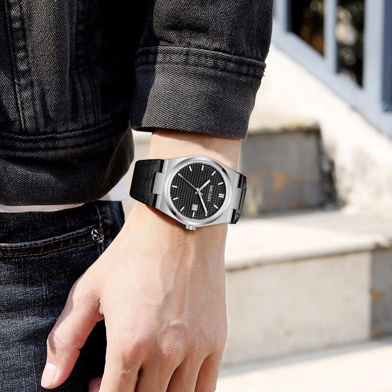 MEGIR 8406 quartz watch on the wrist, silver case, black dial and black leather strap, outdoor shot