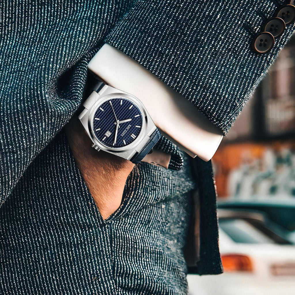 MEGIR 8406 quartz watch on the wrist, silver case, blue textured dial and blue leather strap