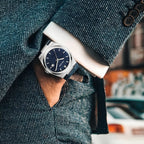 MEGIR 8406 quartz watch on the wrist, silver case, blue textured dial and blue leather strap