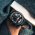 MEGIR 8408 chronograph watch on the wrist, black case, black dial and black leather strap