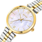 MEGIR 85112 women's quartz watch close-up, gold case, mother-of-pearl dial and two-tone bracelet