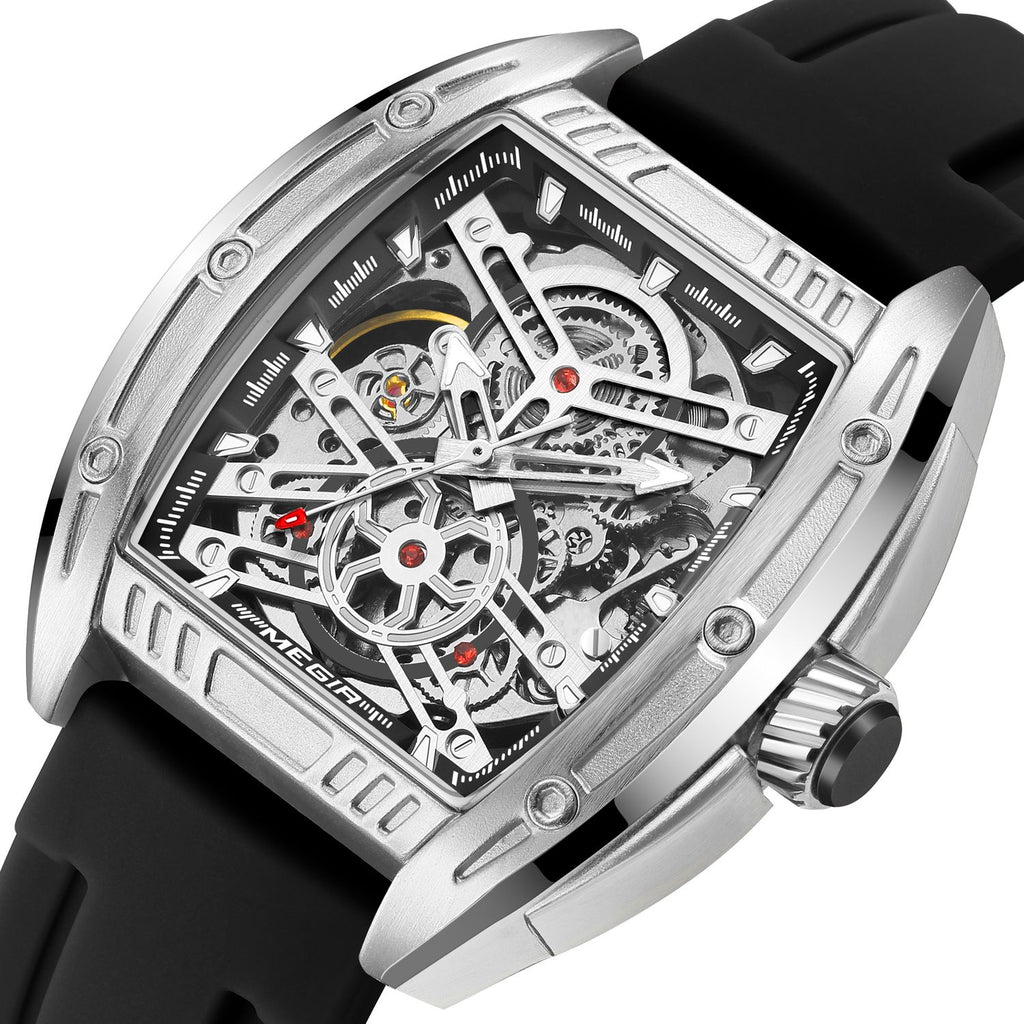 MEGIR 8601 skeleton automatic watch, silver case, openwork dial and black silicone strap, angled view