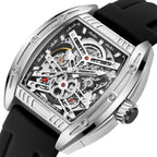 MEGIR 8601 skeleton automatic watch, silver case, openwork dial and black silicone strap, angled view