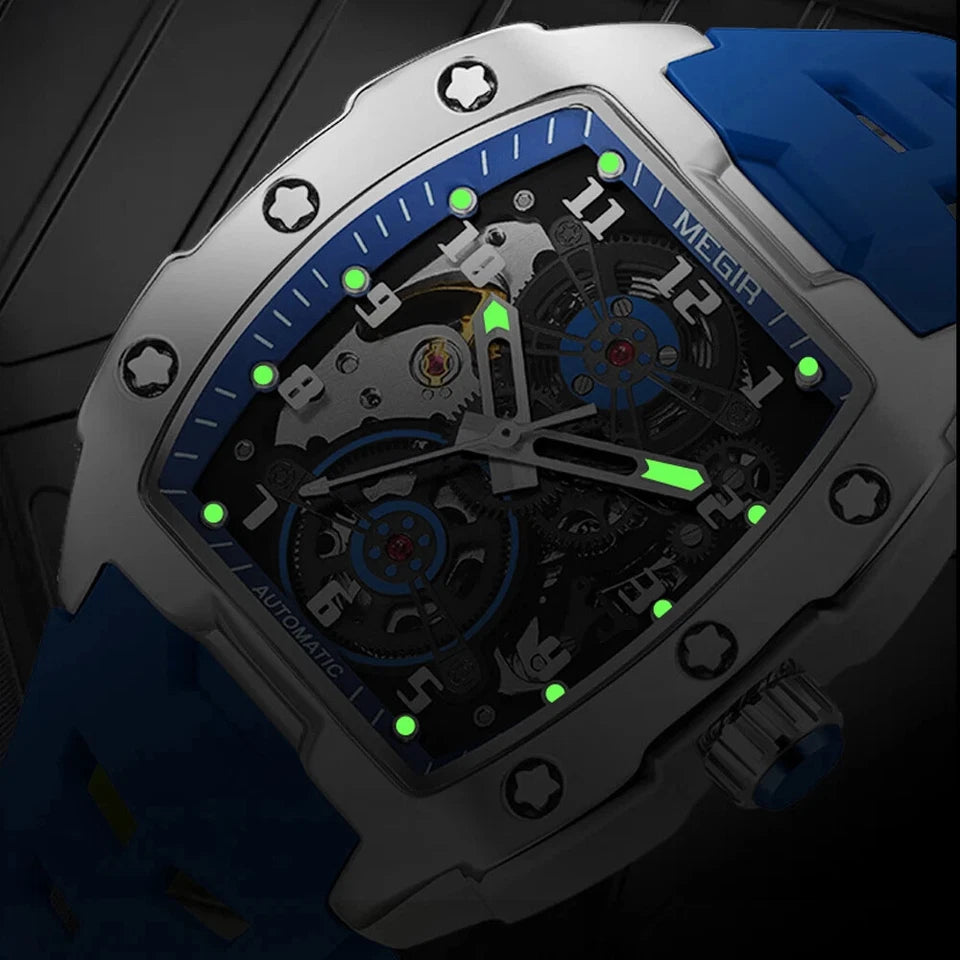 MEGIR 8602 automatic tourbillon close-up detail with green luminous markers and blue silicone strap