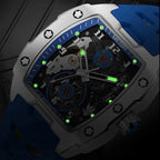 MEGIR 8602 automatic tourbillon close-up detail with green luminous markers and blue silicone strap