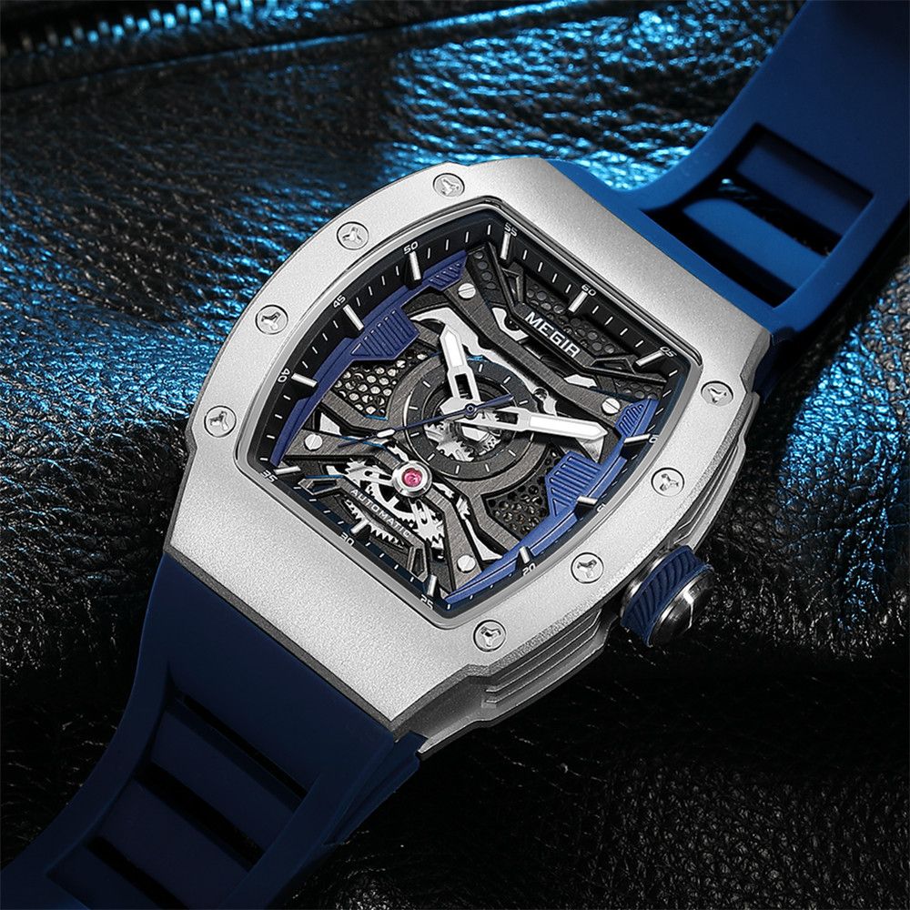 MEGIR 8604 skeleton automatic watch, silver case, blue accents and blue silicone strap, beauty shot