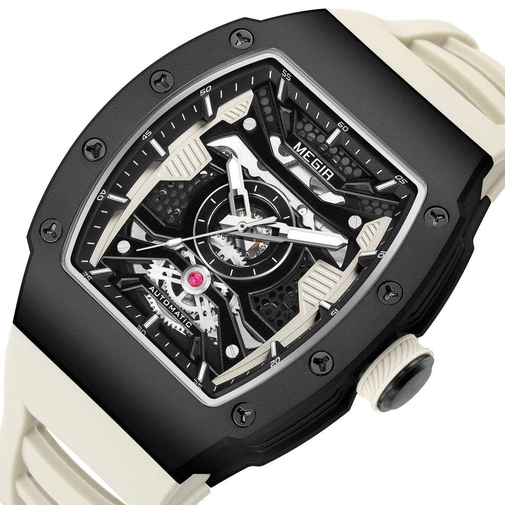 MEGIR 8604 skeleton automatic watch, black case, openwork dial and cream silicone strap, angled view
