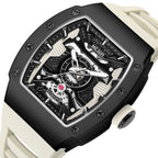 MEGIR 8604 skeleton automatic watch, black case, openwork dial and cream silicone strap, angled view