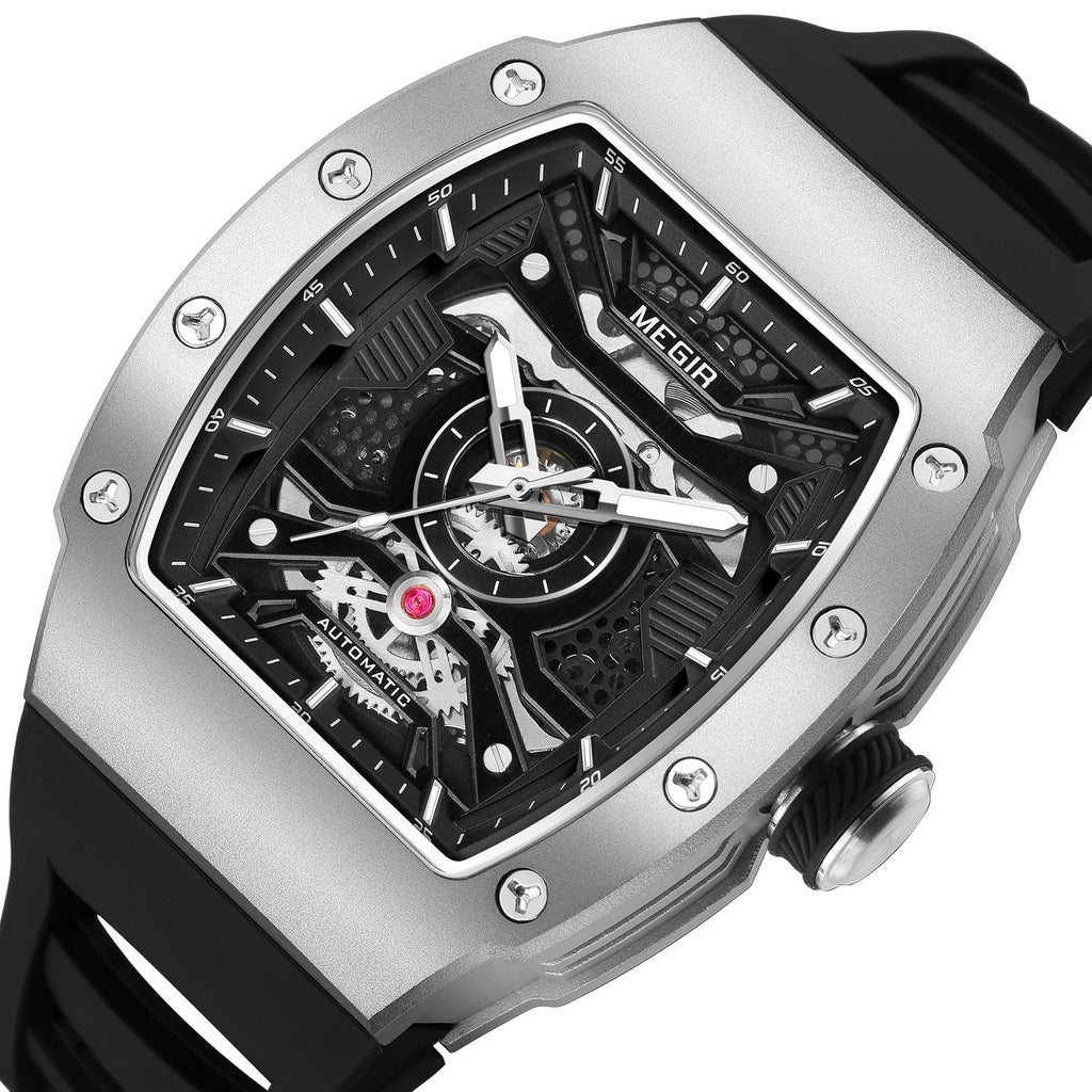 MEGIR 8604 skeleton automatic watch, silver case, openwork dial and black silicone strap, side angle